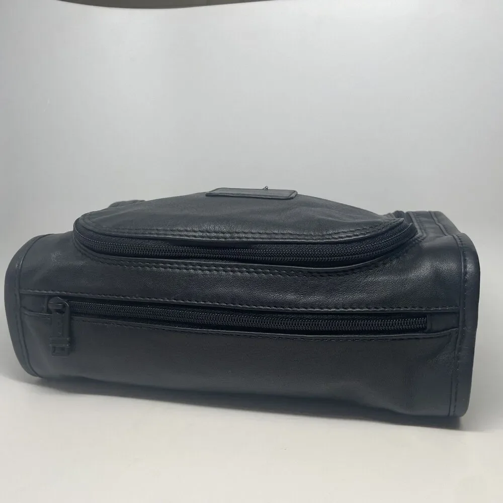 Tumi black leather